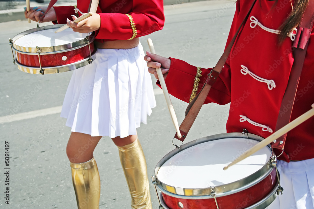Two drummer girls on the city parade.