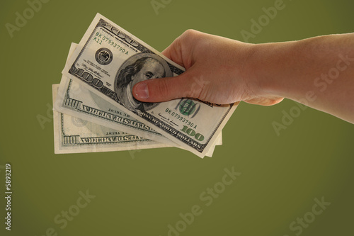 hand holding money