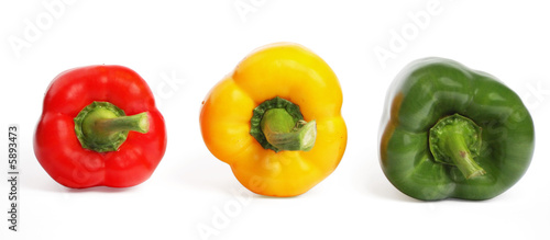 Multicolored peppers on the white background