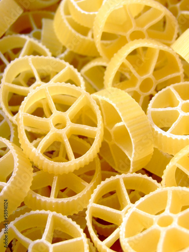 Close-up of raw wheel shaped pasta