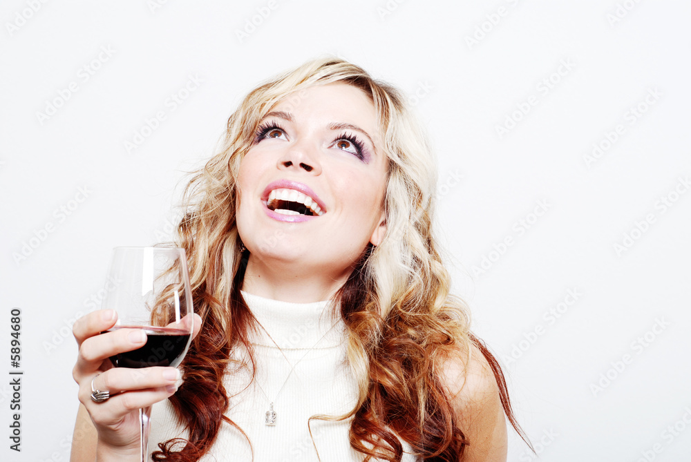a sexy girl is having a drink and enjoying herself