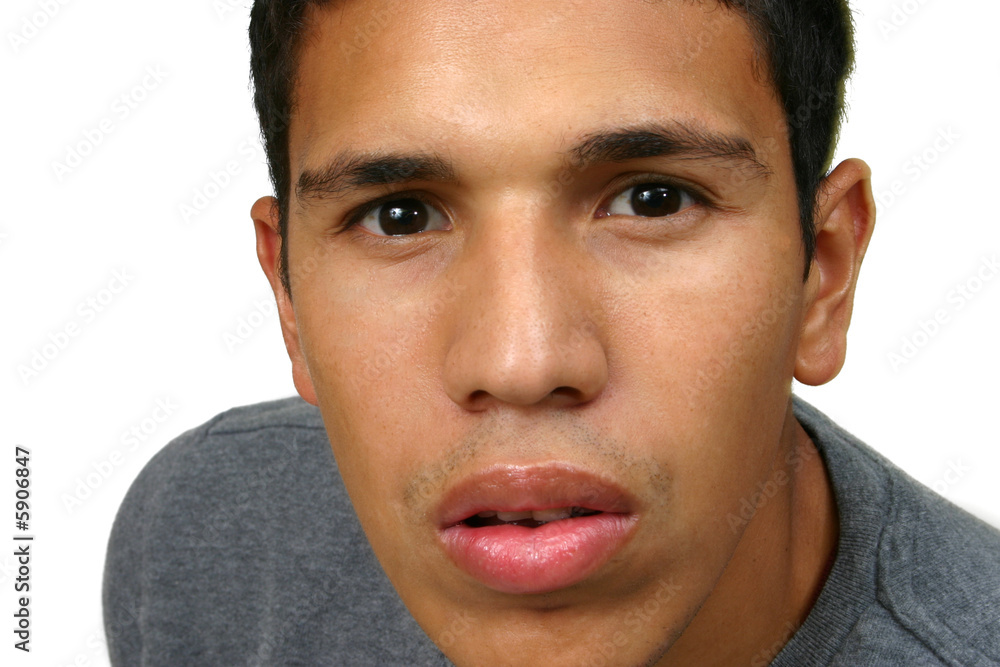 Obraz premium Young Hispanic Man Concentrated