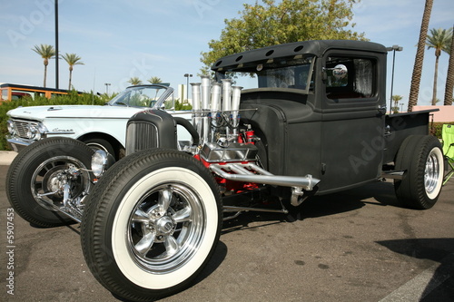 Classic black street rod at show