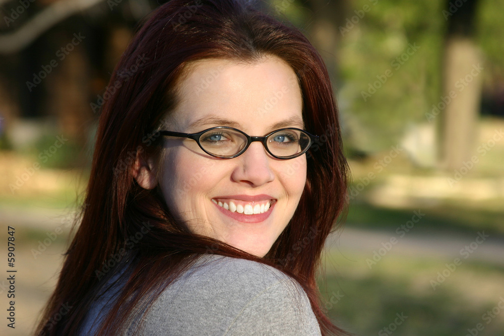Beatiful young woman in her twenties smiling. Beatiful young woman in her twenties smiling.