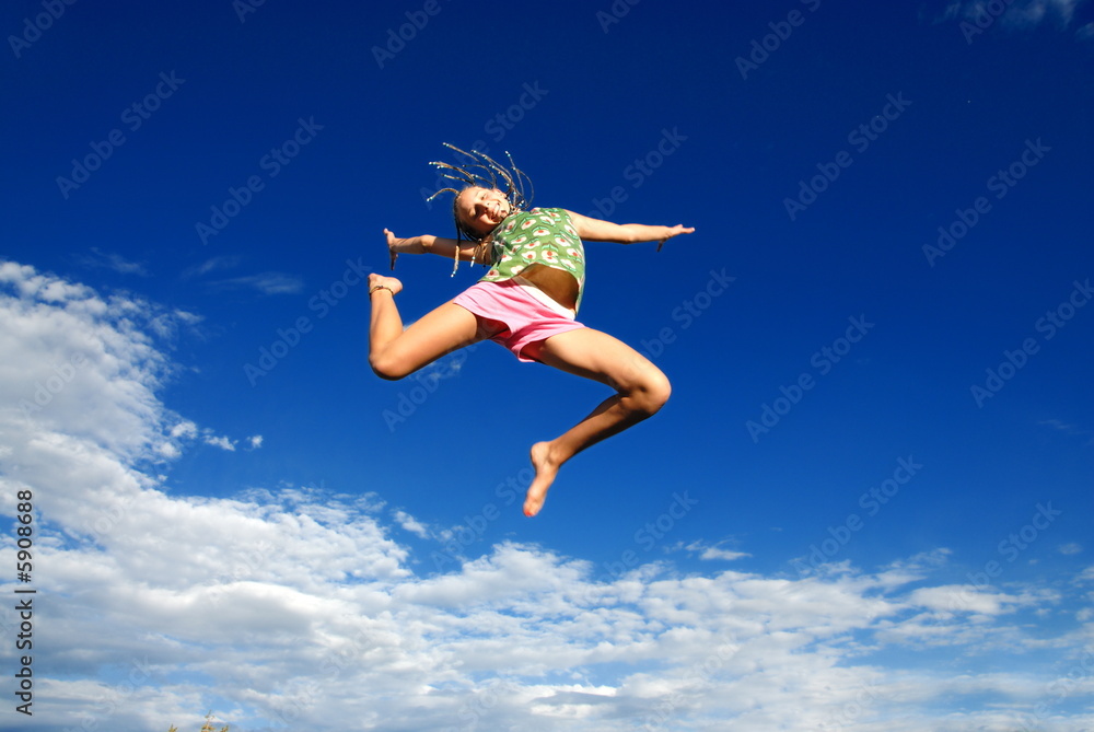 Teen in mid-jump