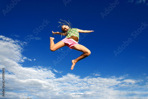 Teen in mid-jump
