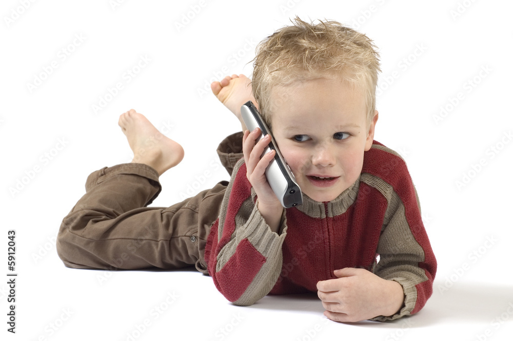 Little boy on the phone, calling his grandpa. Isolated on white. Little boy on the phone, calling his grandpa. Isolated on white.