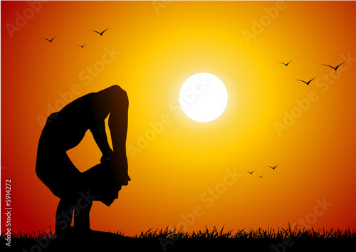 Yoga at sunset © Ube