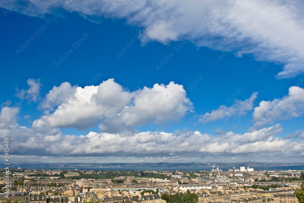 A view of Edinburgh under a cloudy sky from the Calton Hill
