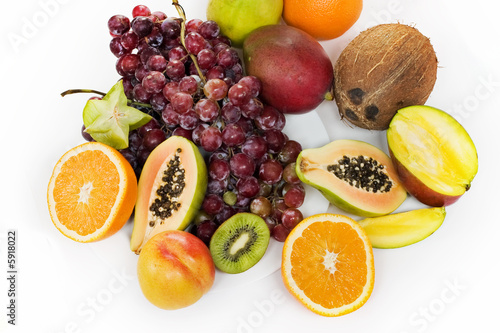 Fototapeta Naklejka Na Ścianę i Meble -  Healthy fruit assortment with papaya, kiwi, orange and grapes