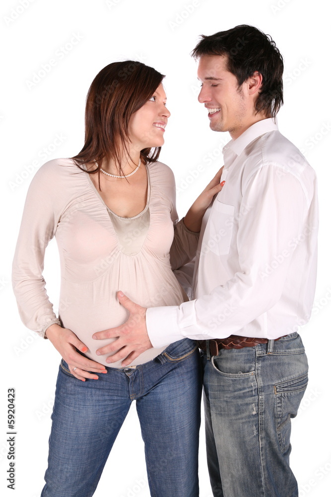 Pregnant couple embrace Pregnant couple embrace