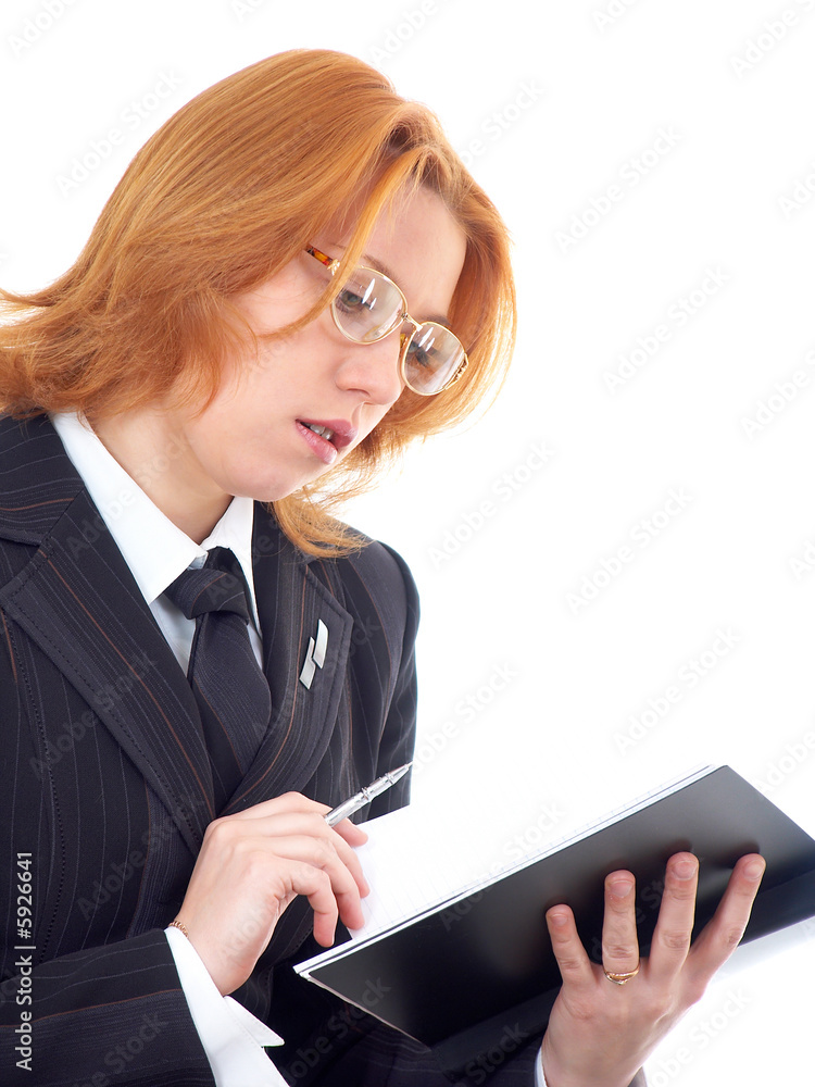 Young red-haired businesswoman with pen and notebook Young red-haired businesswoman with pen and notebook