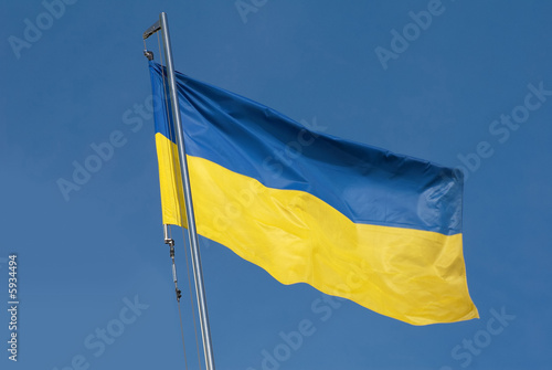 National flag of Ukraine on blue sky