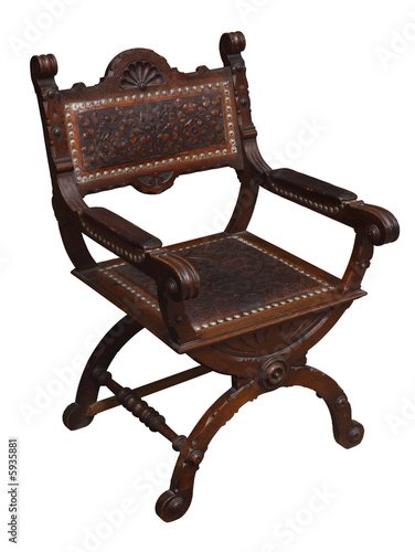 A wooden Renaissance armchair. Isolated.