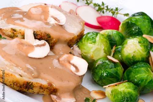 garlic roast pork with mushrooms sauce, brussels sprouts
