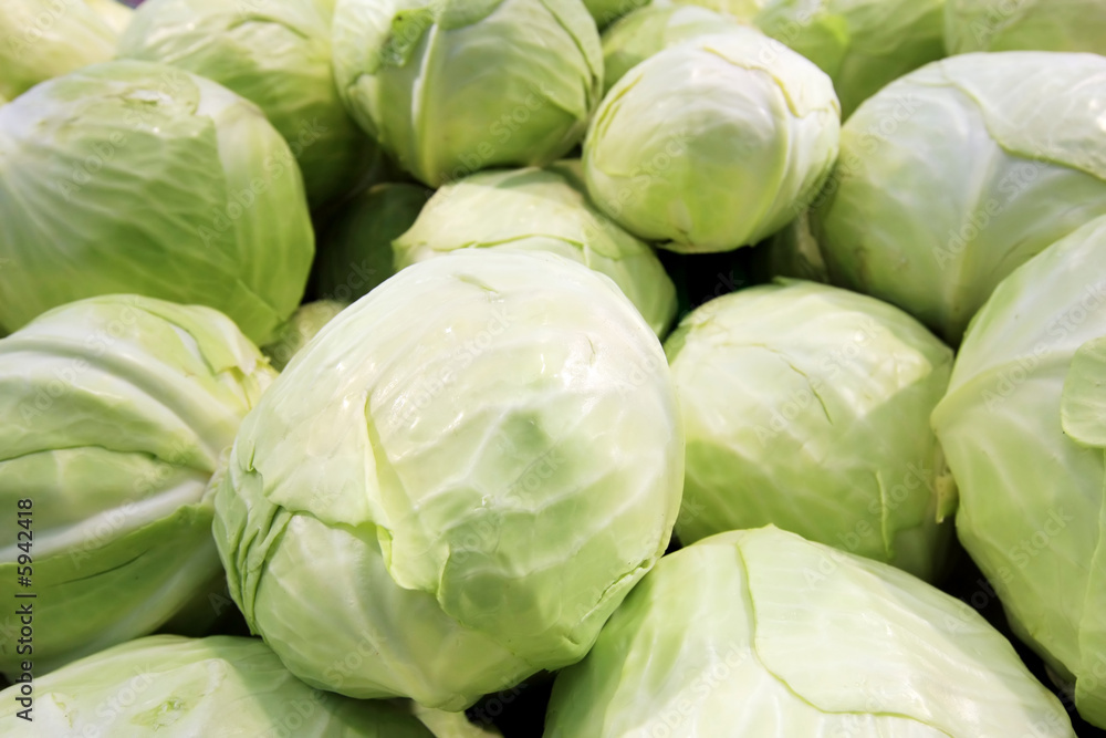 Fresh cabbage at a farmer's market. Fresh cabbage at a farmer's market.