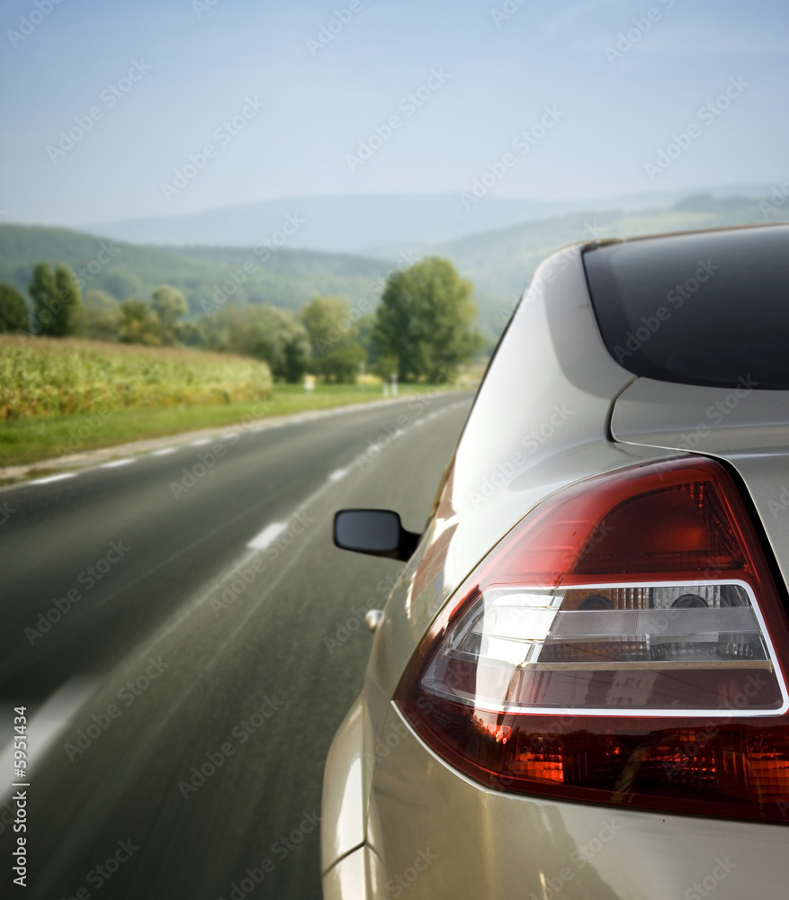 Silver car on the road