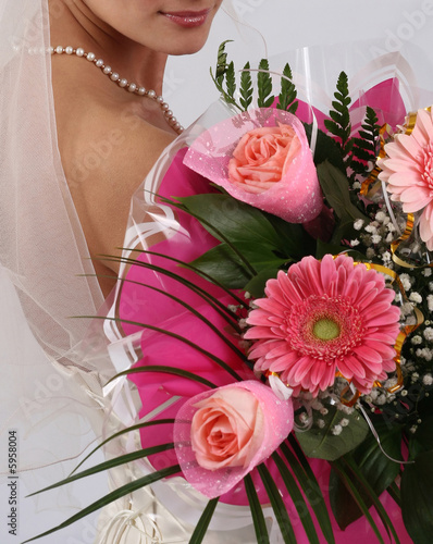 Bride with boukuet in hand photo