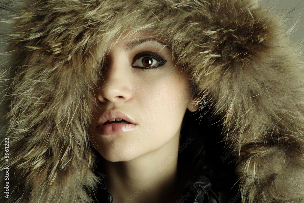 young elegant girl with fur coat. Studio portrait young elegant girl with fur coat. Studio portrait