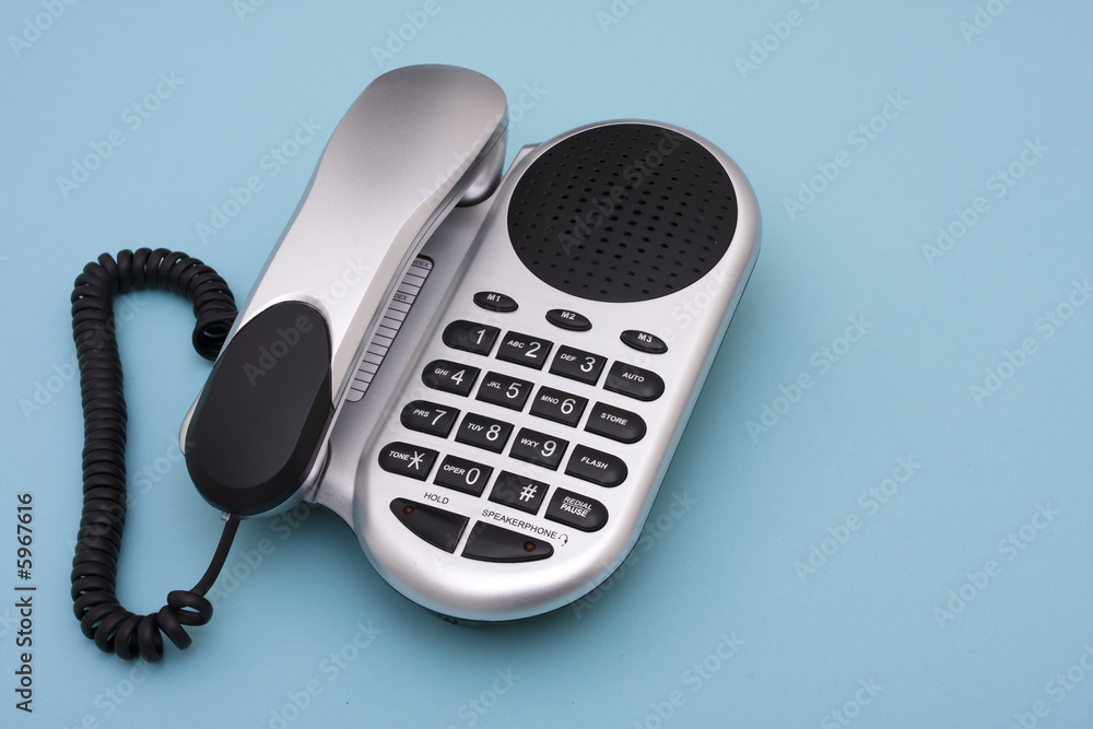 Telephone on blue background with copy space Telephone on blue background with copy space