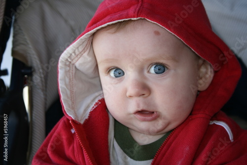 baby in red photo