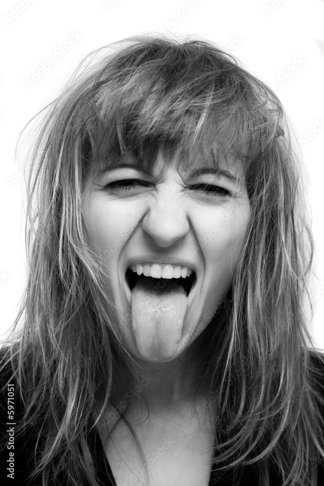 Woman sticking one's tongue at somebody Woman sticking one's tongue at somebody