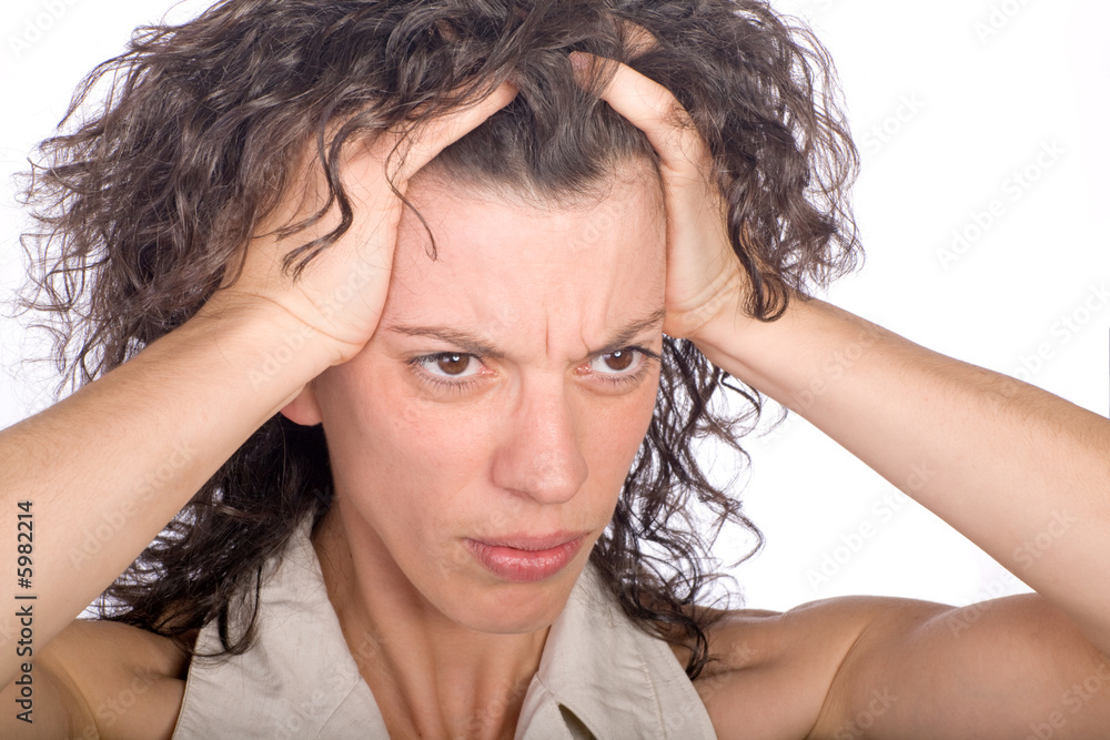 Fototapeta premium woman having a strong headache put hands on her head