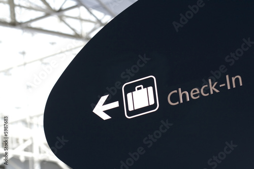 Check-in sign in international airport  photo