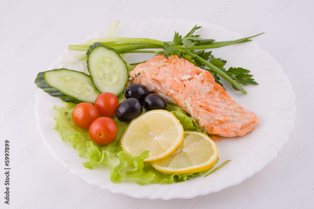Stake from a trout with vegetables Stake from a trout with vegetables