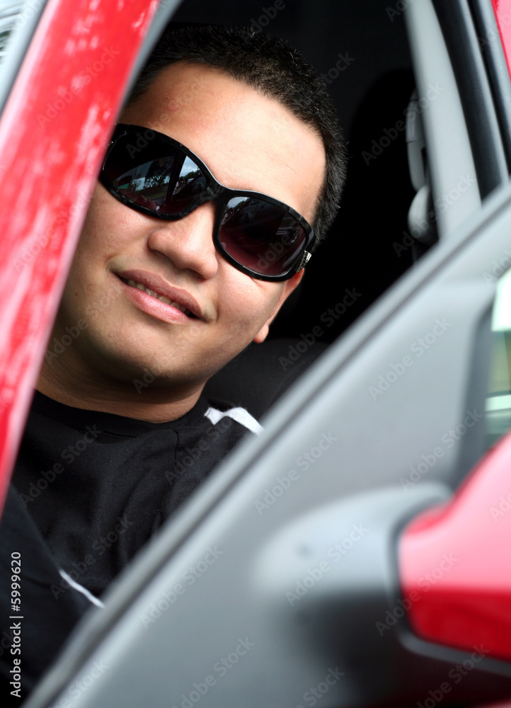 Young Asian Male inside the Car Young Asian Male inside the Car