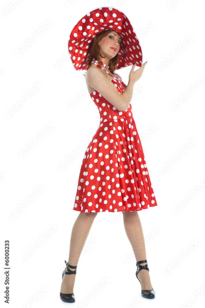 portrait redheaded with spotted dress on white background