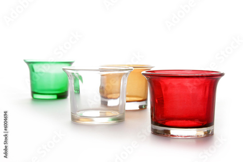 White background with colored candle bottles