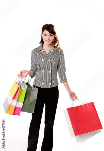 young woman with many shopping bags