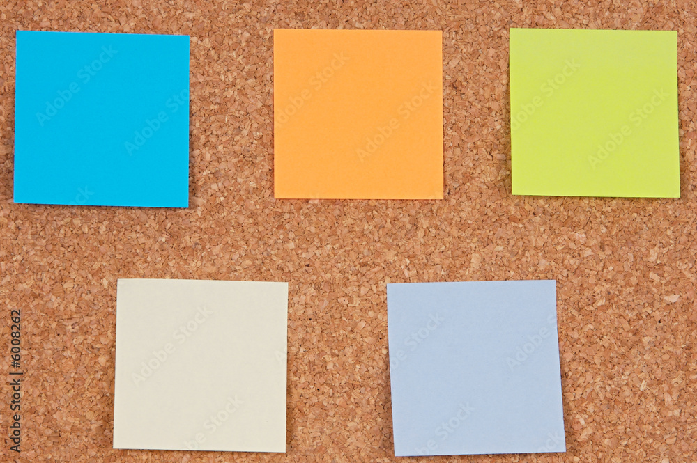 Photo of notes posted to a cork board Photo of notes posted to a cork board