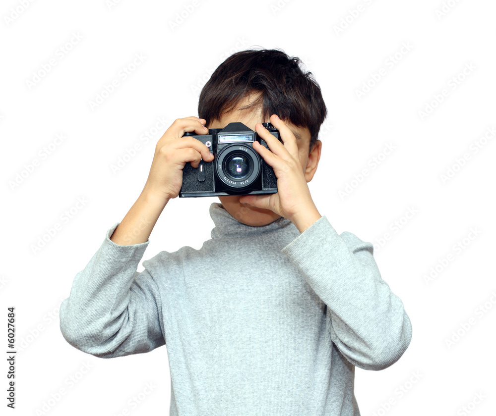 asian boy photographing with black slr camera isolated on white asian boy photographing with black slr camera isolated on white