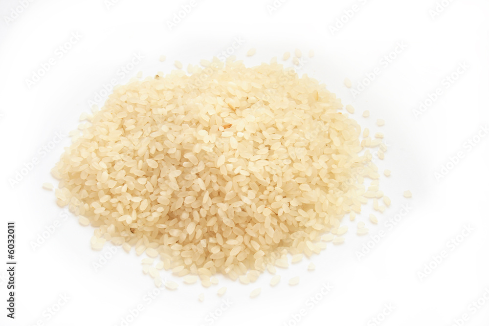 On a photo of grain of rice. A photo on a white background On a photo of grain of rice. A photo on a white background