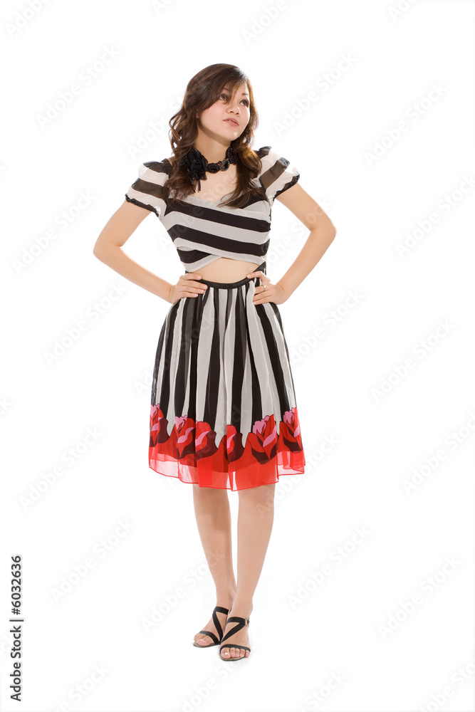 woman in black & white stripes dress look up while thinking woman in black & white stripes dress look up while thinking