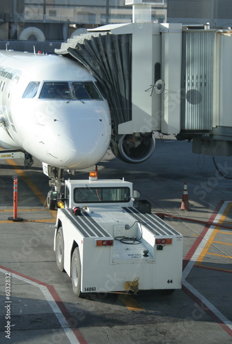 Airplane parked at gate