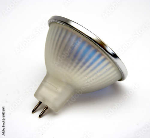 Fluorescent small spot light bulb at white background