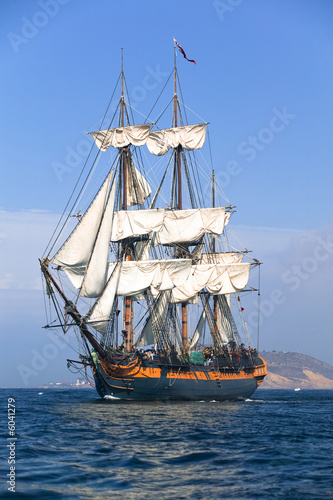 HMS Surprise Sailing Ship at Sea under full sail 