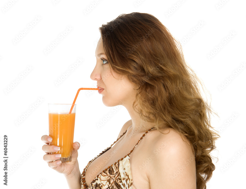Attractive brunette drink orange juice. Isolate on white. Attractive brunette drink orange juice. Isolate on white.