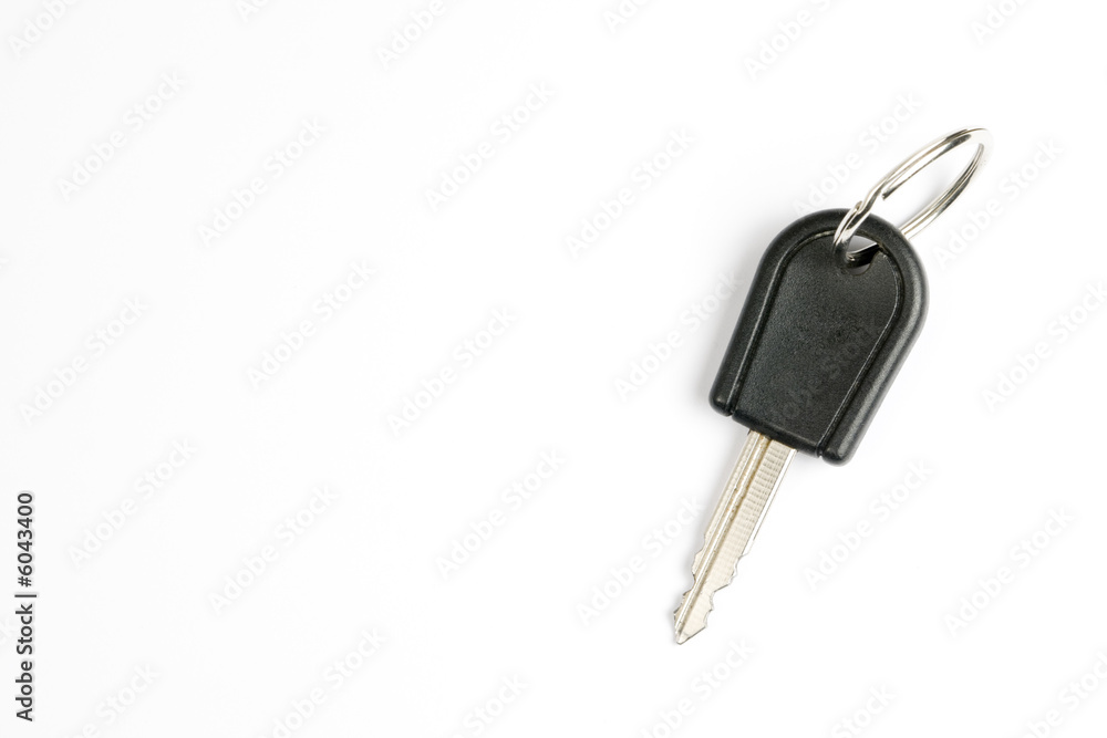 Car key on a white background. Horizontal shot. Car key on a white background. Horizontal shot.