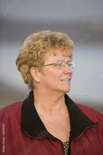 mature womand looking out over the area
