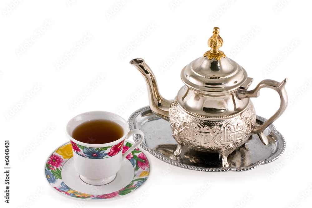 Ancient silver teapot and cup to tea Ancient silver teapot and cup to tea