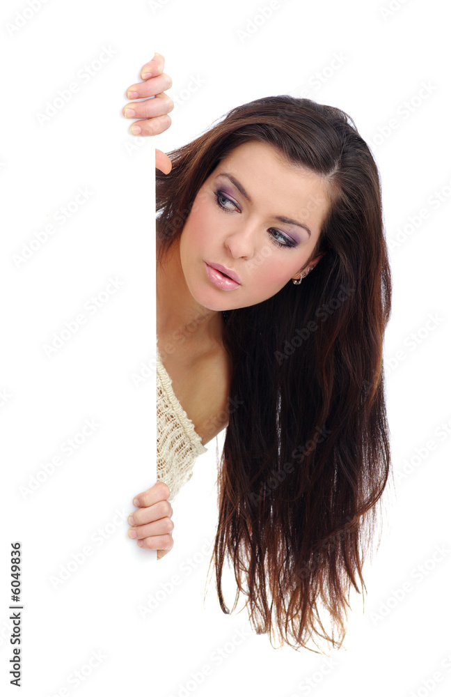 Portrait of a beautiful woman holding a blank billboard.