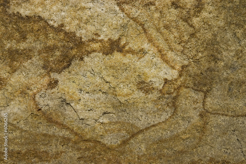 an old natural stone texture with cracks