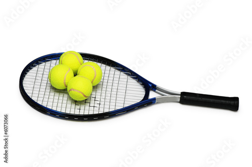 Tennis rackets and four  balls isolated on white © Elnur