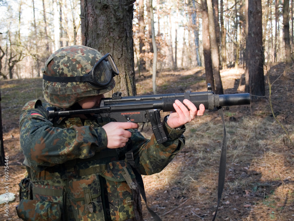 Fototapeta premium Soldier aiming the target