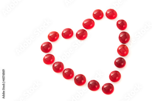 Red gem stones in a heart shape