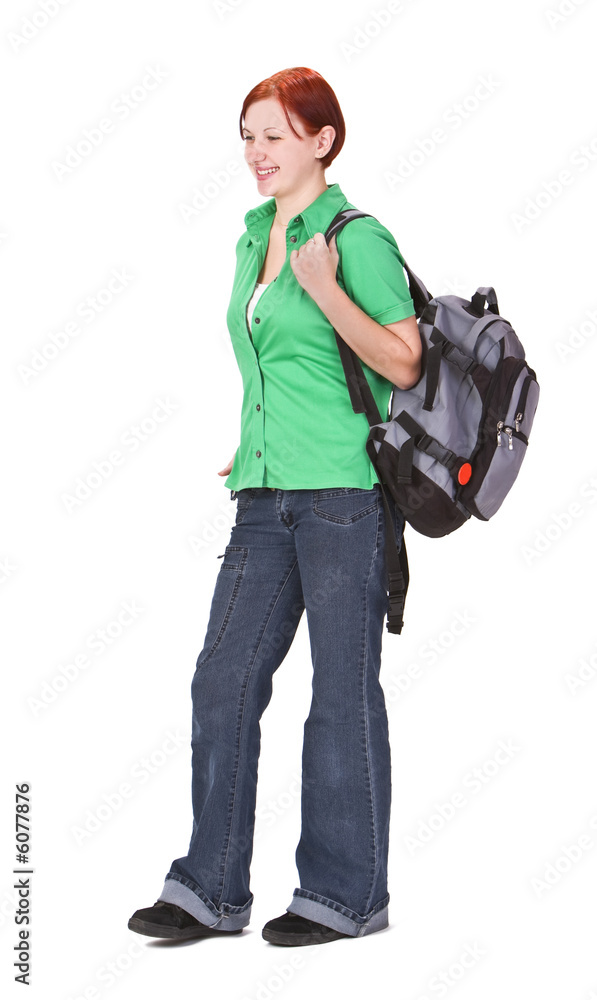 Redheaded teenage backpacker against a white background. Redheaded teenage backpacker against a white background.